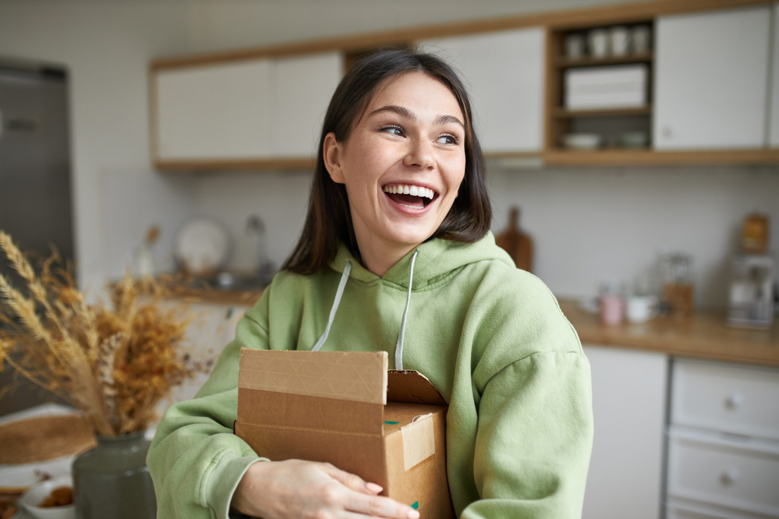 Shipment, delivery, moving and online shopping concept. Happy ov